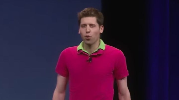 Sam Altman in 2008, a white man with short brown hair wearing a pink polo shirt over a green polo shirt