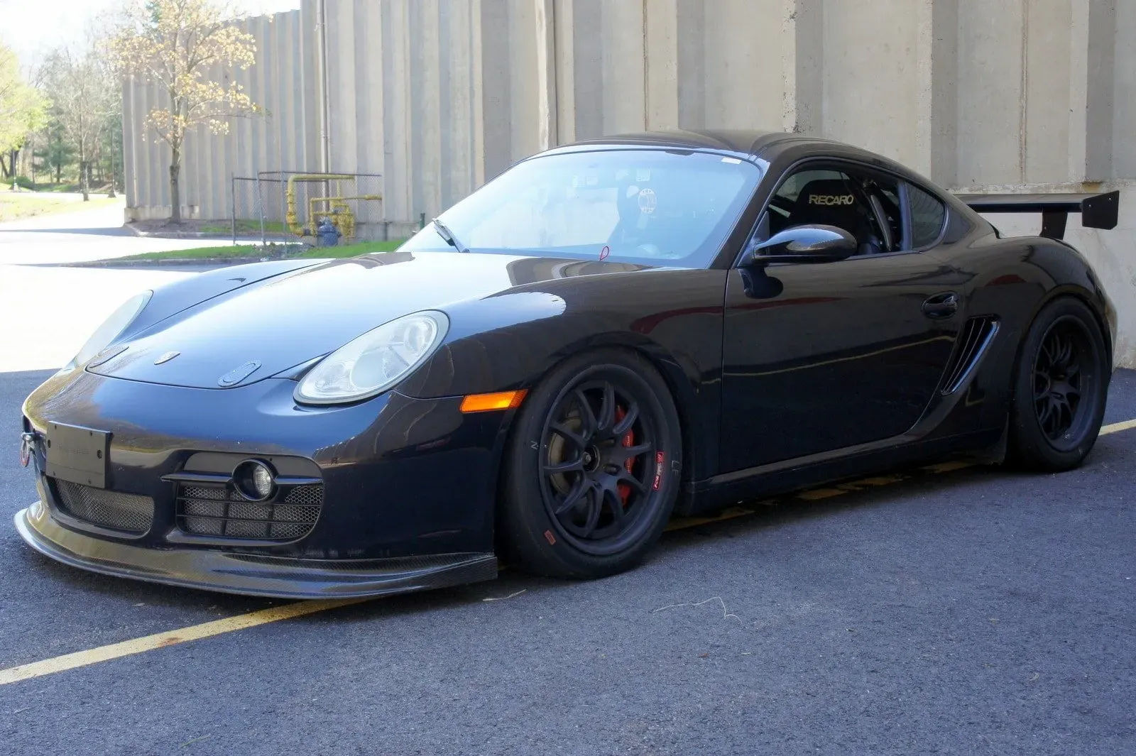 Porsche Cayman S Negro en pista