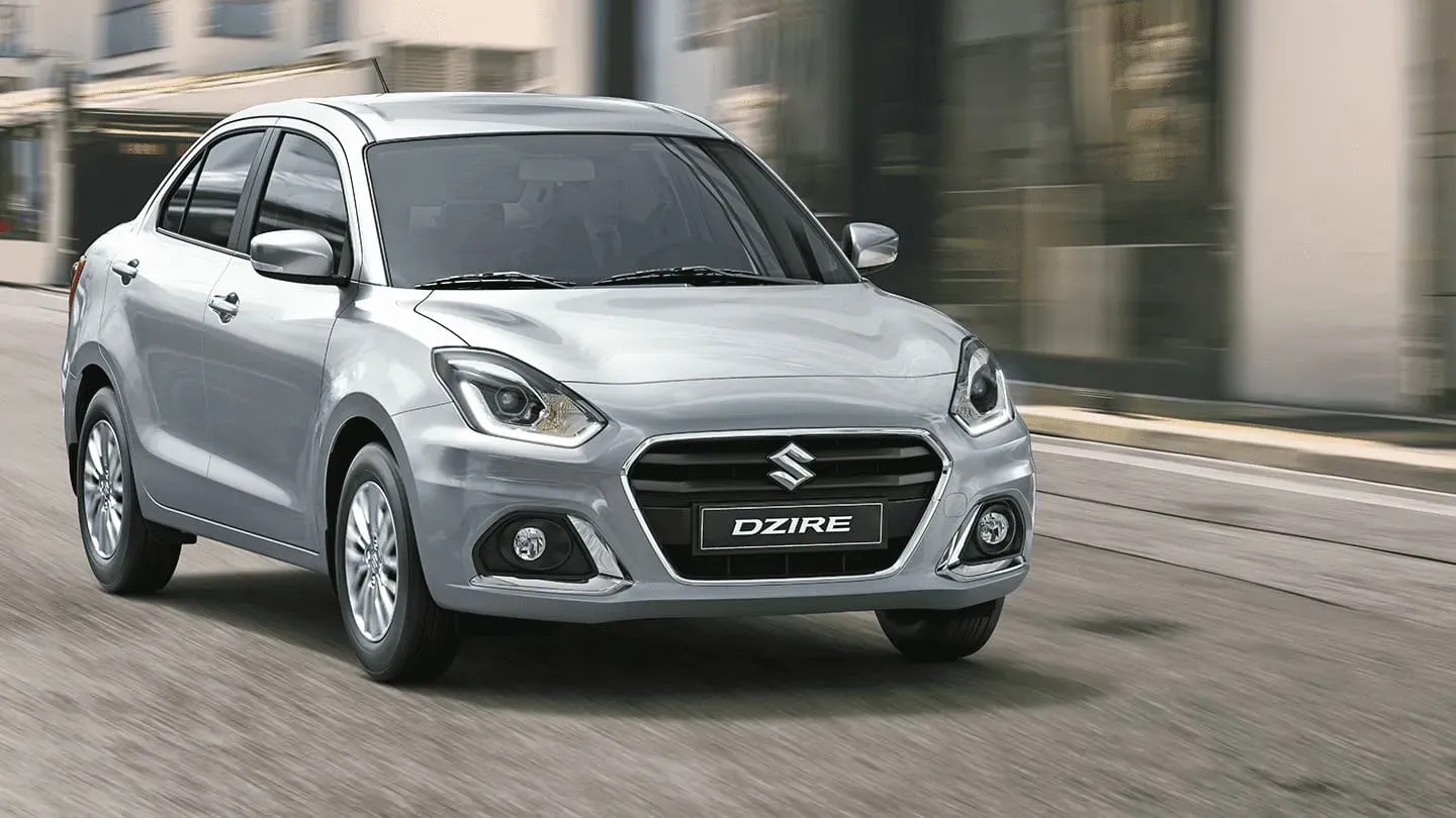 Vista lateral del suzuki dzire mostrando su perfil de sedán compacto