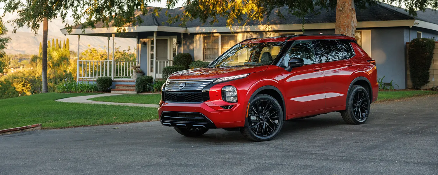 Vehículo Rojo Nissan Rogue Plug
