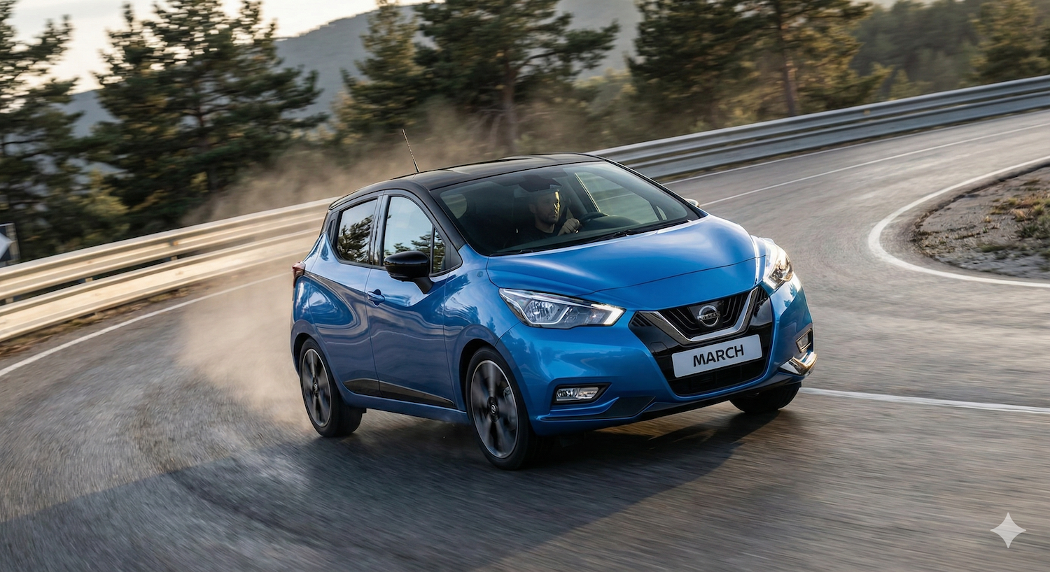 Nissan March 2026 en una curva de carretera, demostrando su comportamiento dinámico y estable.