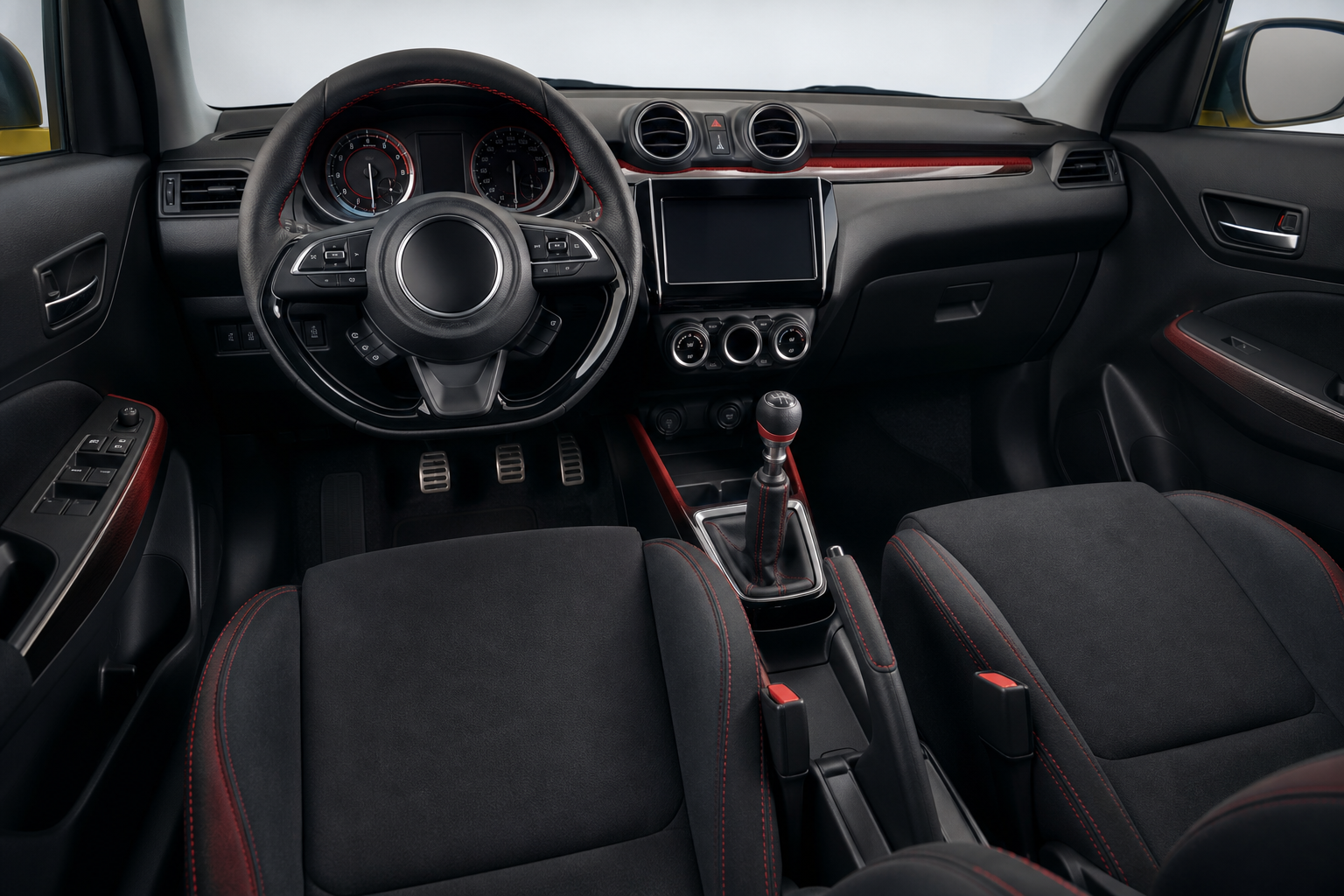 Interior deportivo del Suzuki Swift Sport Final Edition con asientos tipo cubo y costuras rojas