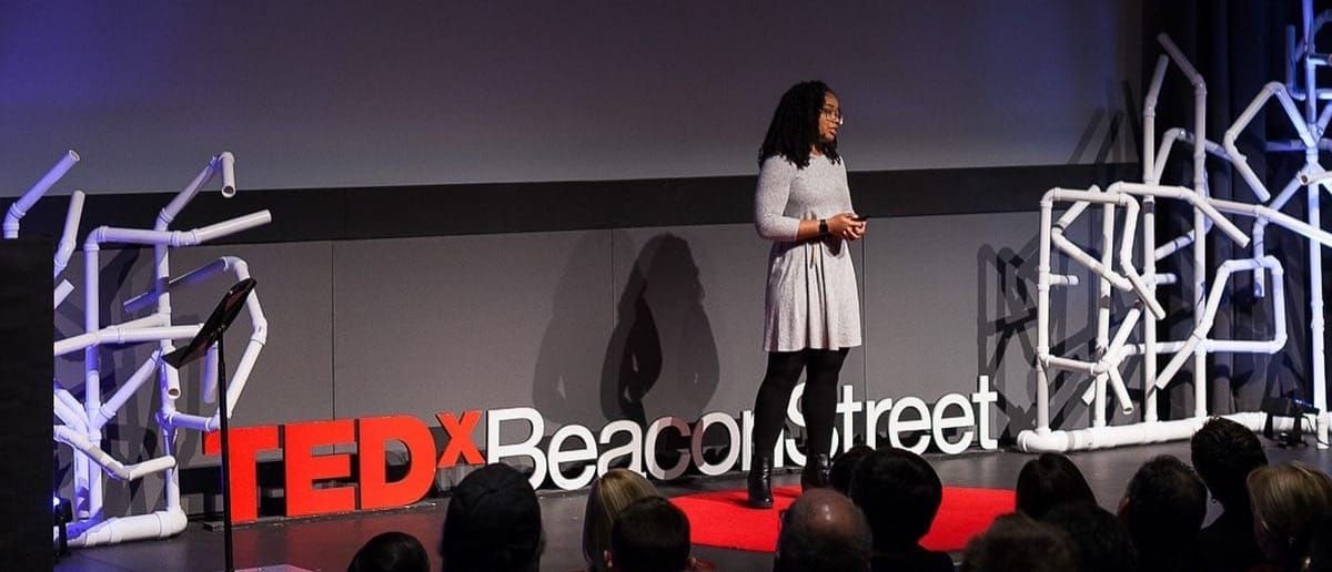 Jordan Harrod speaking on AI ethics at the TEDxBoston