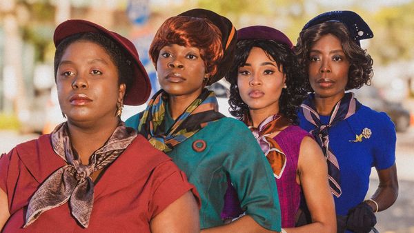 Four actors dressed in 1960s-style clothing and hats stand side by side outdoors, portraying the women activists of Cadillac Crew in the upcoming production at The Studio@620.