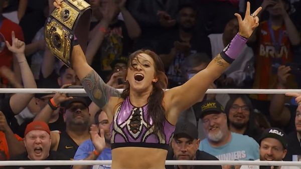 Kris Statlander celebrates AEW Women's World Championship victory.