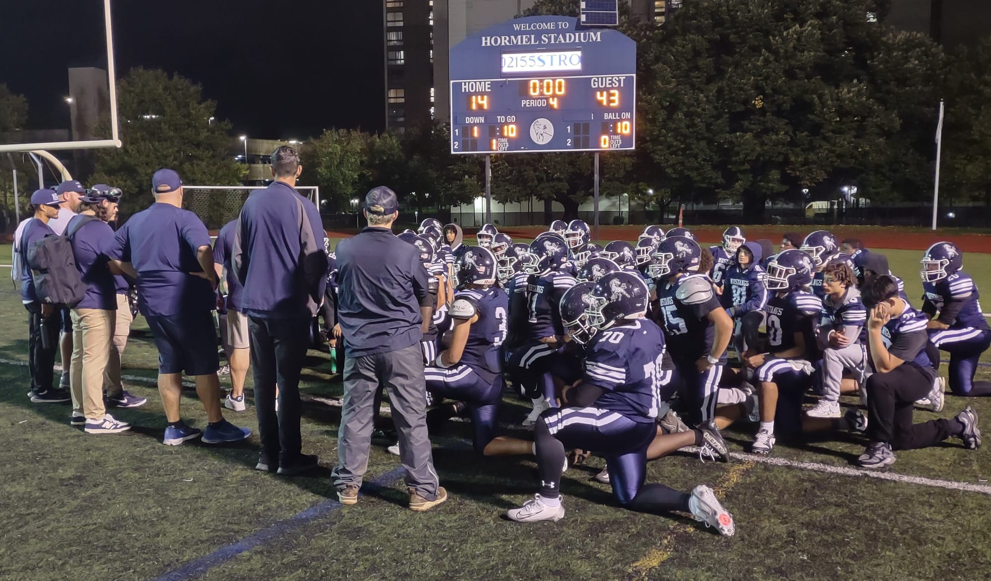 Medford football falls to Revere, but not without a fight