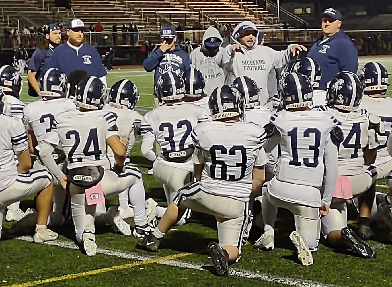 Medford High football team battles Lynn English to tough 32-12 loss