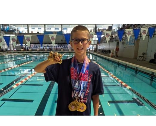Mystic Valley swimmer Liam Murphy wins six gold medals at Junior Olympics post image
