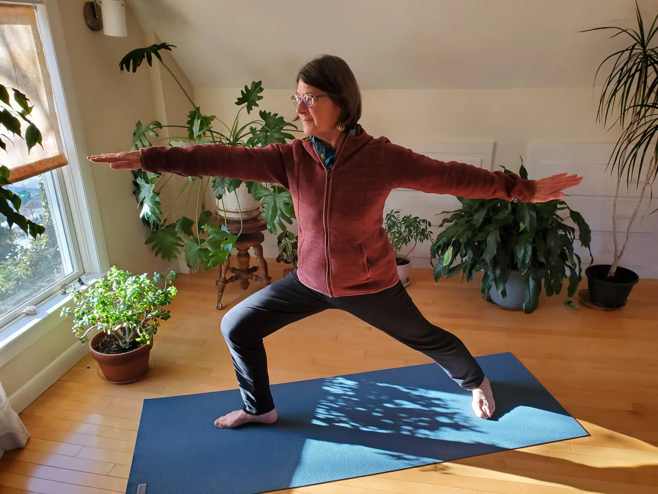 Medford teacher Judy Scribner-Moore instructs older students in yoga tailored to their needs