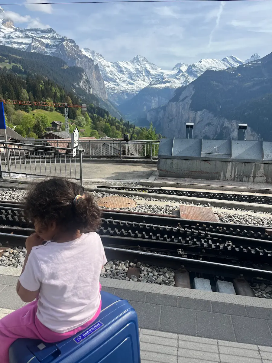 First view of Wengen village arriving by train, Lauterbrunnen Valley below, Jungfrau Region