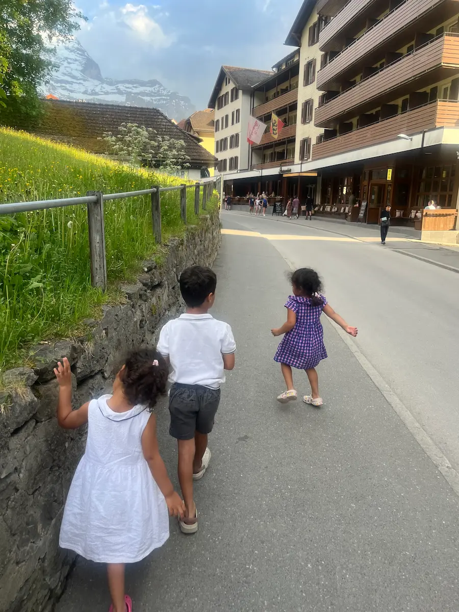 Kids running in Wengen, the car free village
