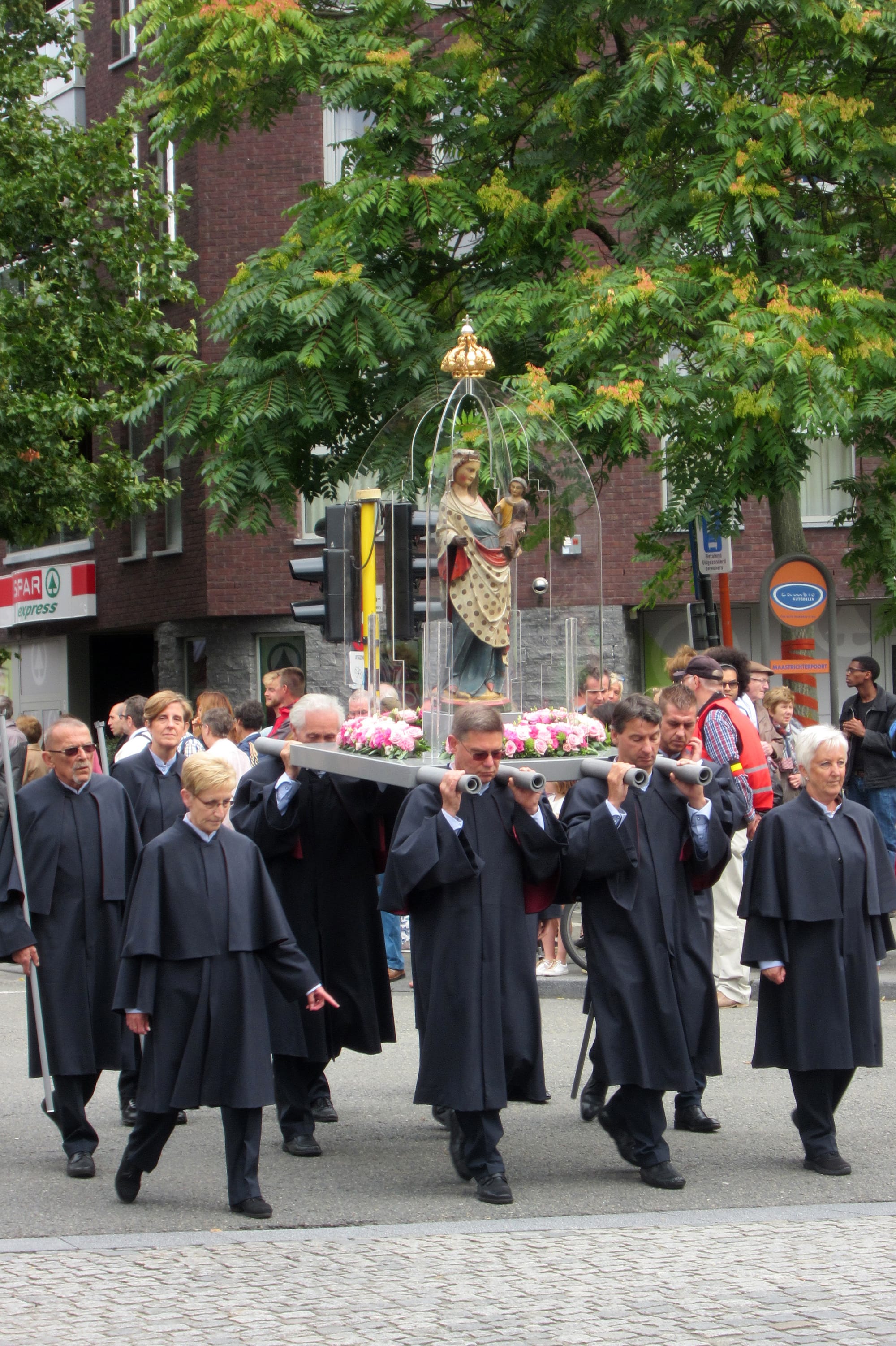 During the Virga Jesse Festival, the people of Hasselt carry a 14th-century oak statue of the Virgin Mary through the streets - Wikimedia Commons
