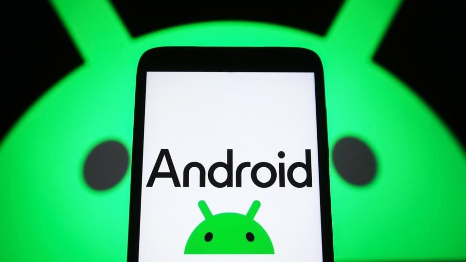 In this photo illustration, a new Android logo is seen on a...