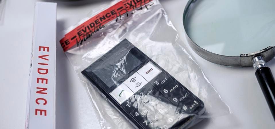 Smartphone in an evidence bag awaiting digital forensic examination.
