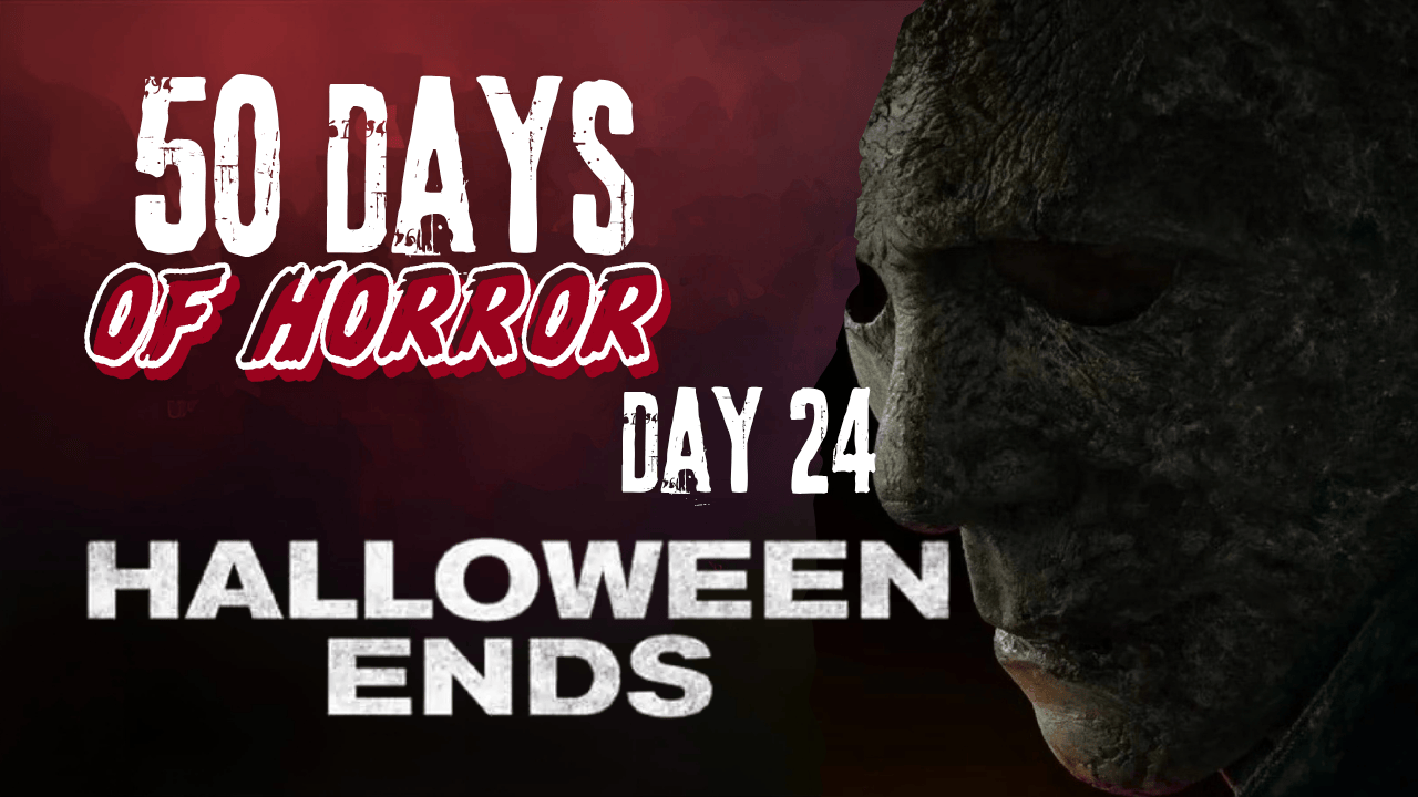 50 Days of Horror Day 24 title card for Halloween Ends, featuring a close-up still of Michael Myers' weathered mask against a dark red background.