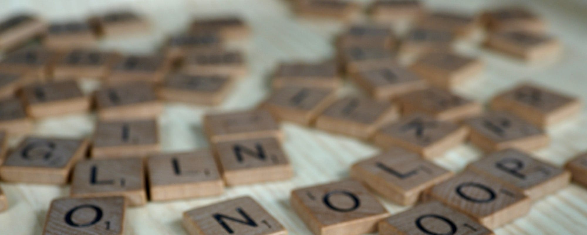 brown and white letter blocks