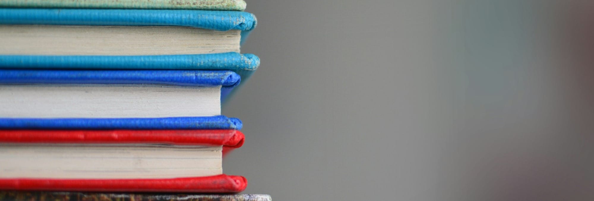 shallow focus photography of books