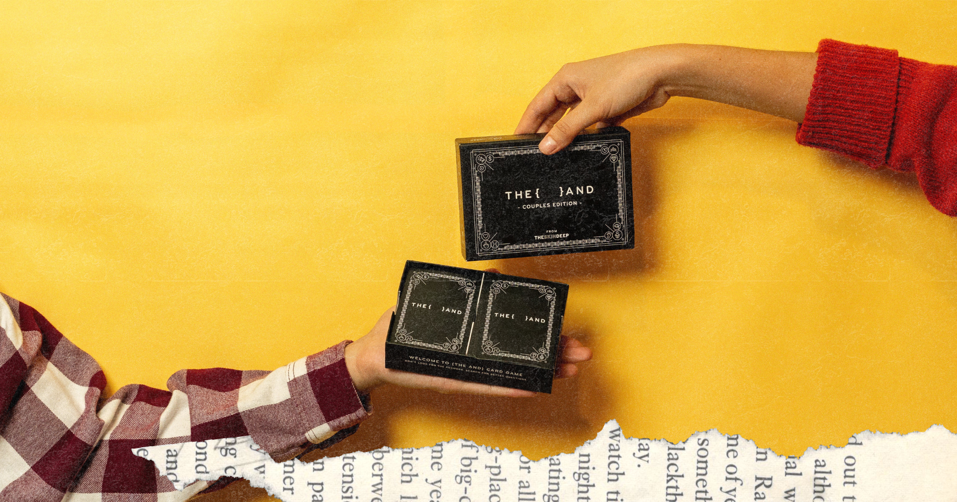 Picture of two hands holding {THE AND} Couples conversation card game box