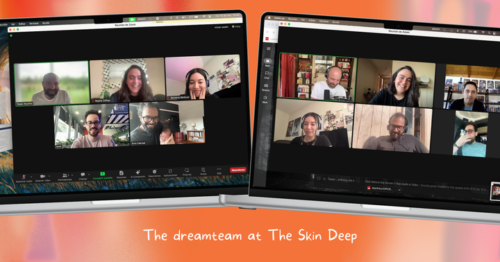 Two laptops with screenshots of women and men holding a meeting on Zoom laughing and smiling