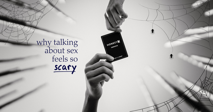 Picture of two hands holding a card from the Honest X intimacy card game