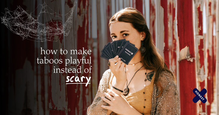 Picture of a woman holding a bunch of Honest X cards to her face covering her mouth