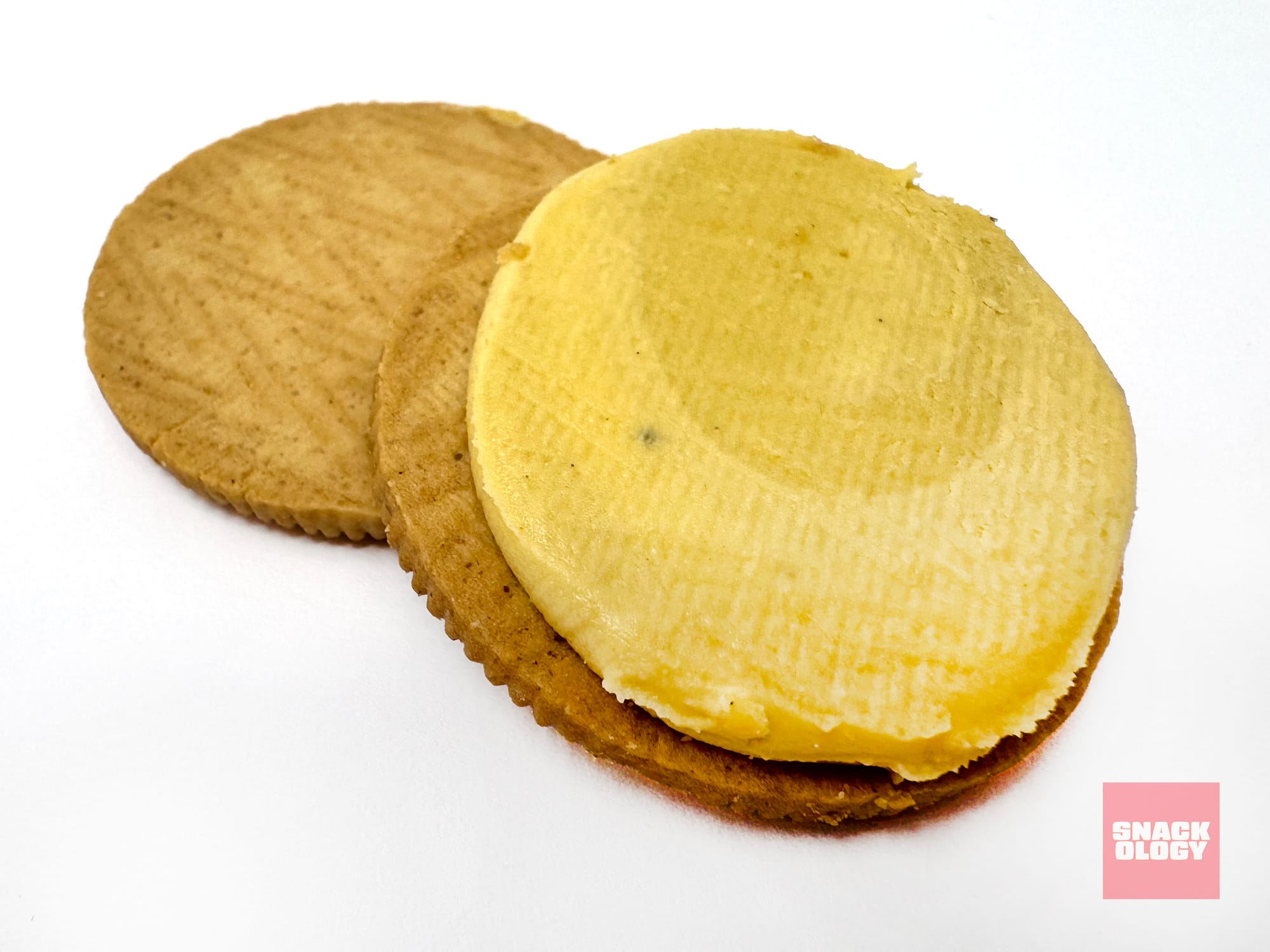 An open Oreo Maple Creme cookie