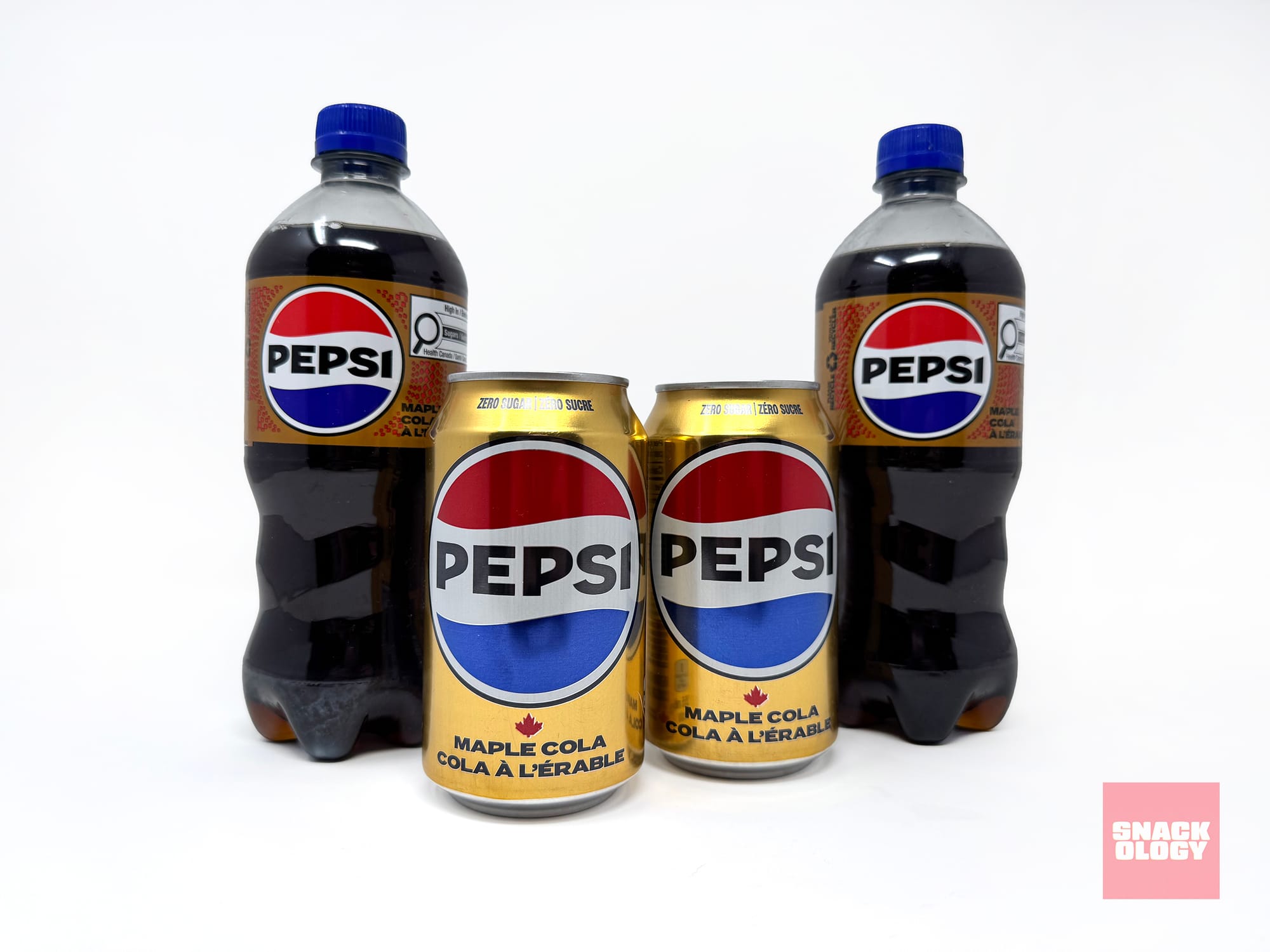 Bottles of Pepsi Maple Cola and cans of Pepsi Zero Sugar Maple Cola