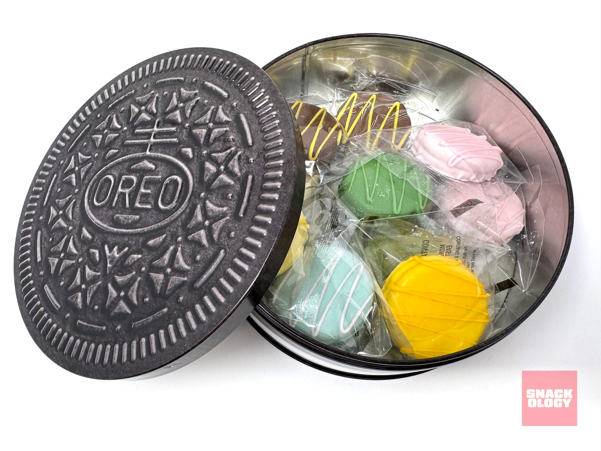An open Oreo Summer Carnival Cookie Tin