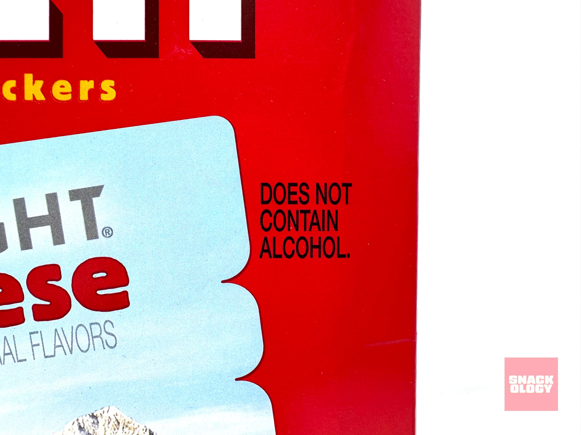 A note on the box of Cheez-It Coors Light Beer Cheese flavored crackers that reads “Does not contain alcohol”