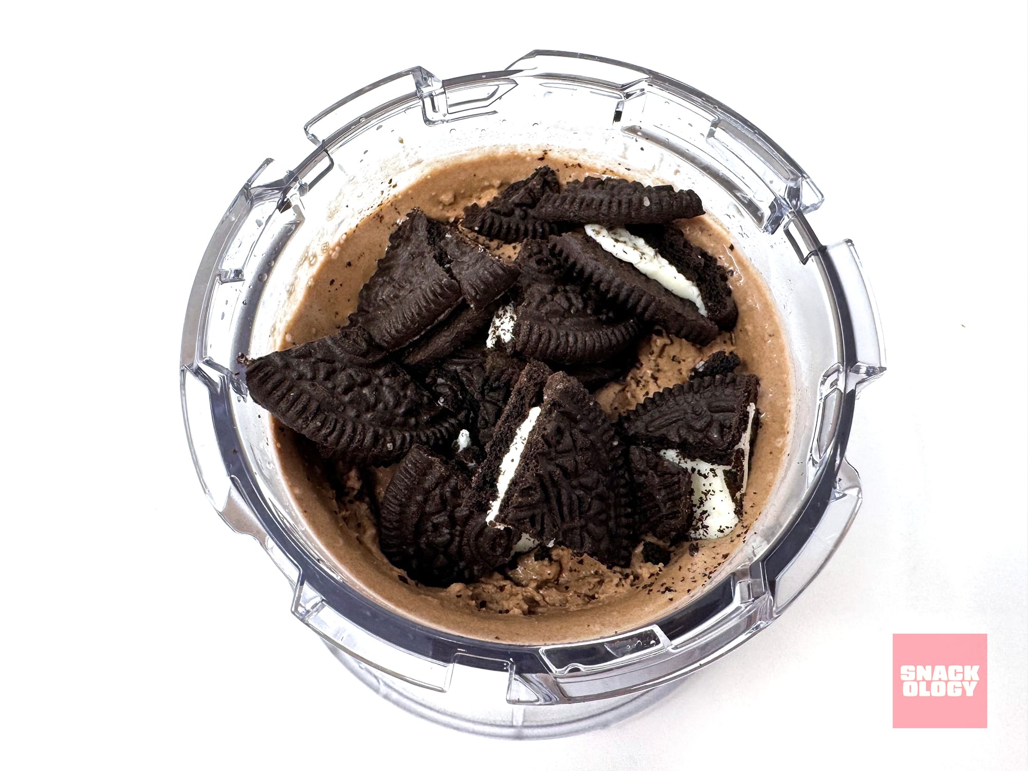 A half-pint of Chocolate Cookies and Cream Ice Cream with quartered Oreo cookies