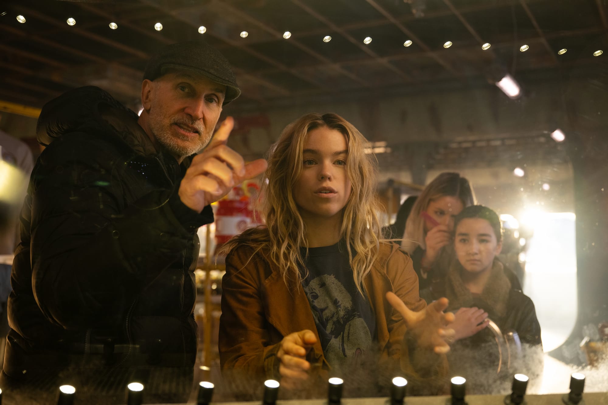 Director Craig Gillespie, Milly Alcock and Eve Ridley on the set of Supergirl
