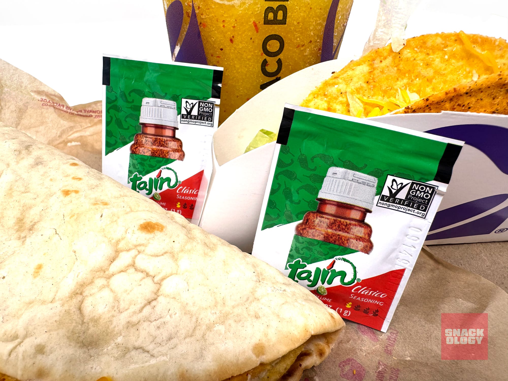Tajín Cheesy Gordita Crunch, Tajín Clásico Seasoning packets, Tajín Pineapple Strawberry Freeze and Tajín Taco
