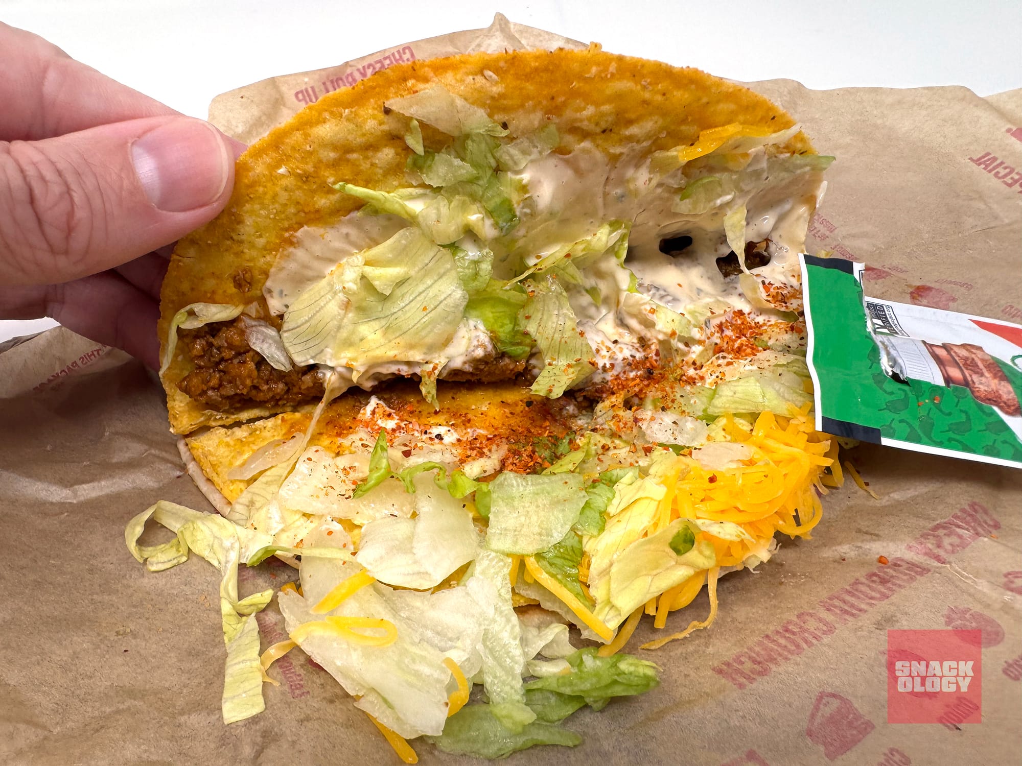 Tajín Cheesy Gordita Crunch with extra Tajín Clásico Seasoning