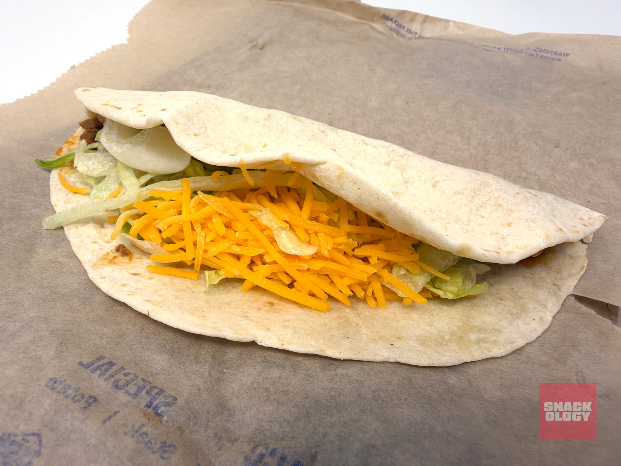A seasoned beef soft taco