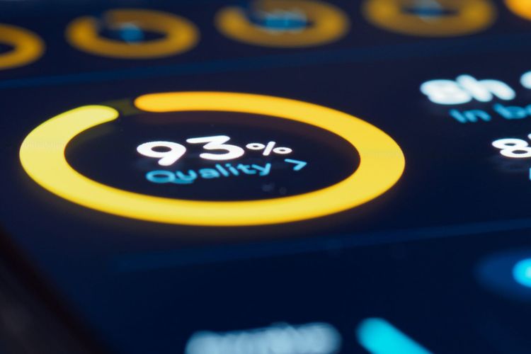 A glowing amber dial on a dark dashboard reads 93% Quality, surrounded by blurred gauges, representing a confident metric that does not confirm the data itself is correct.
