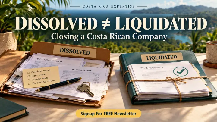 Two company folders labeled “Dissolved” and “Liquidated” on a desk.