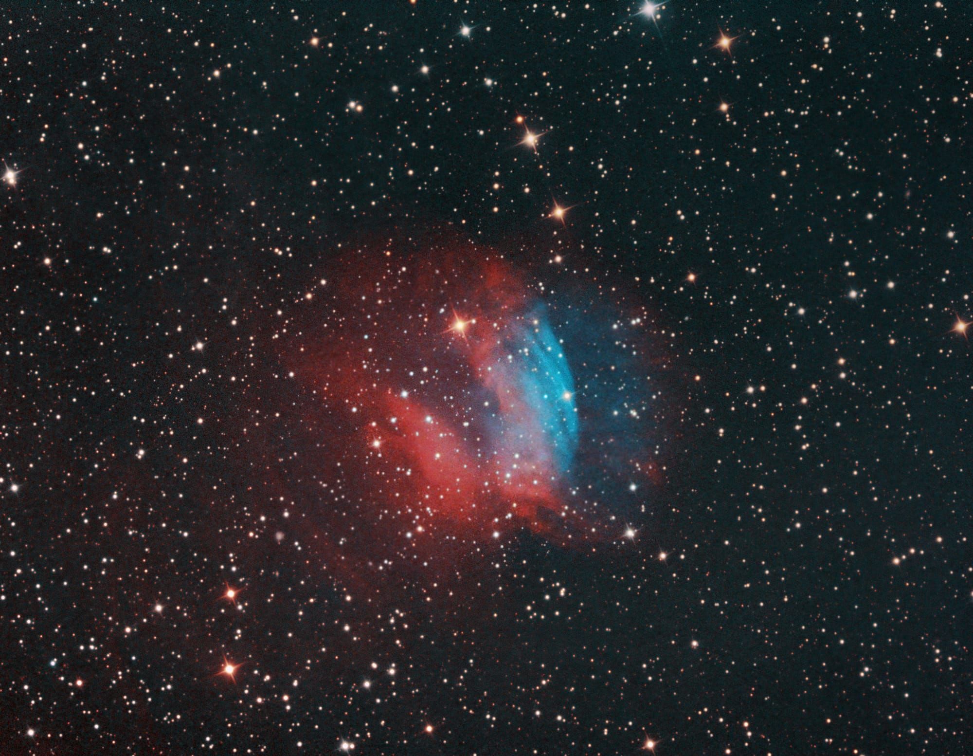 Dark sky filled with bright stars and colorful nebula 