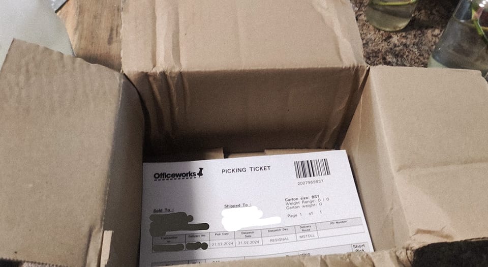 The packing slip inside what appears to be an empty box.
