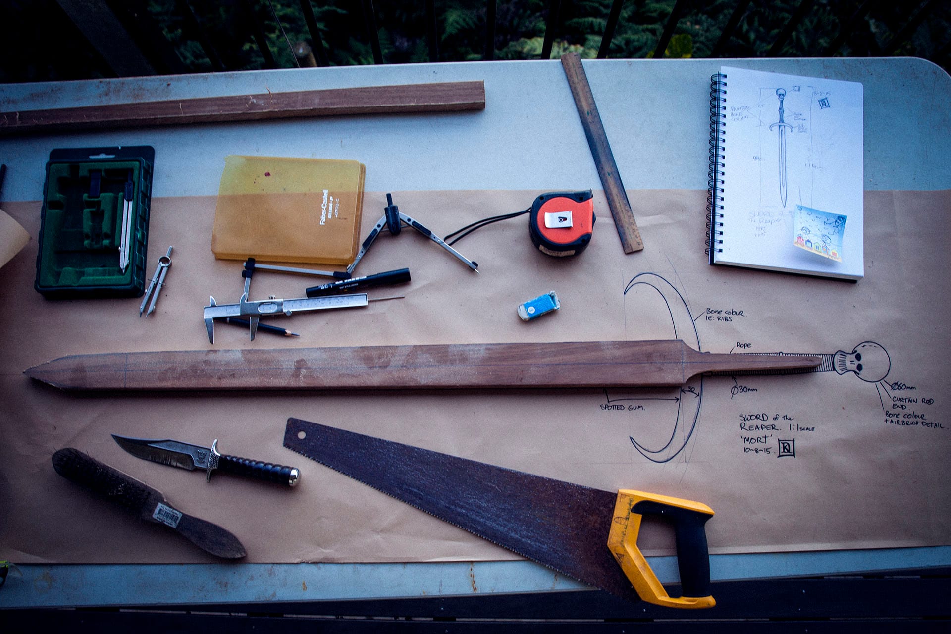 Comparing the blade shape and size to the 1:1 scale design on paper