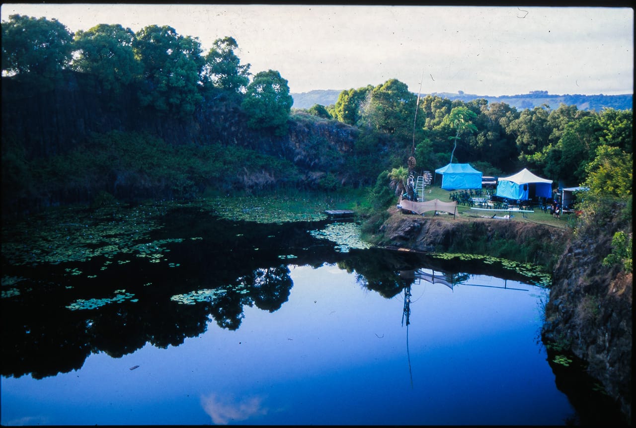 The sun rises overlooking the Island Quarry Lake at Boredoms - Boadrum111 - Byron Bay November 2011
