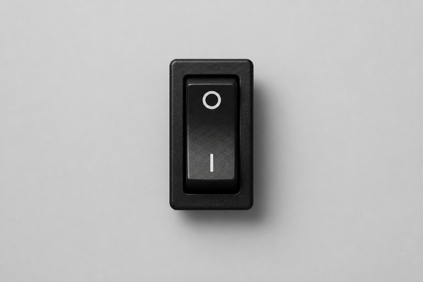 A centered physical power switch in the off position on a solid background