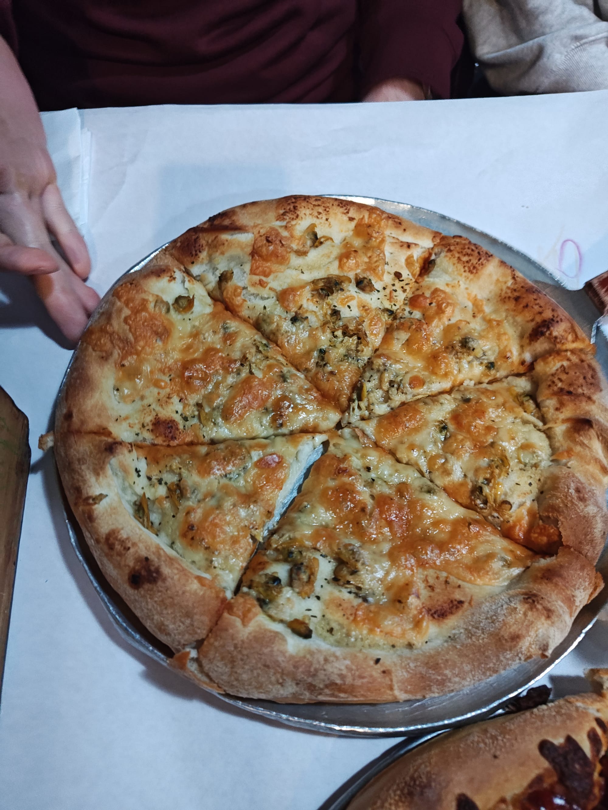 whole, clam pizza with herb sauce