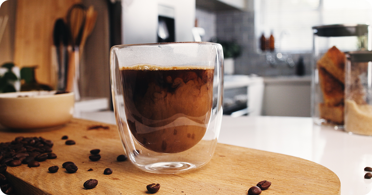 A cup of dark coffee, known as a major cause of tooth discoloration.