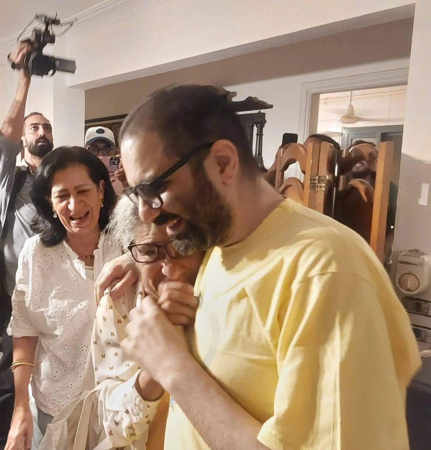 Alaa Abd el Fattah, embraces his mother Layla (who has been on extended hunger strike) upon his release from prison on 22nd Sept. 2025. They both look extremely exhausted but are smiling with relief and joy. 