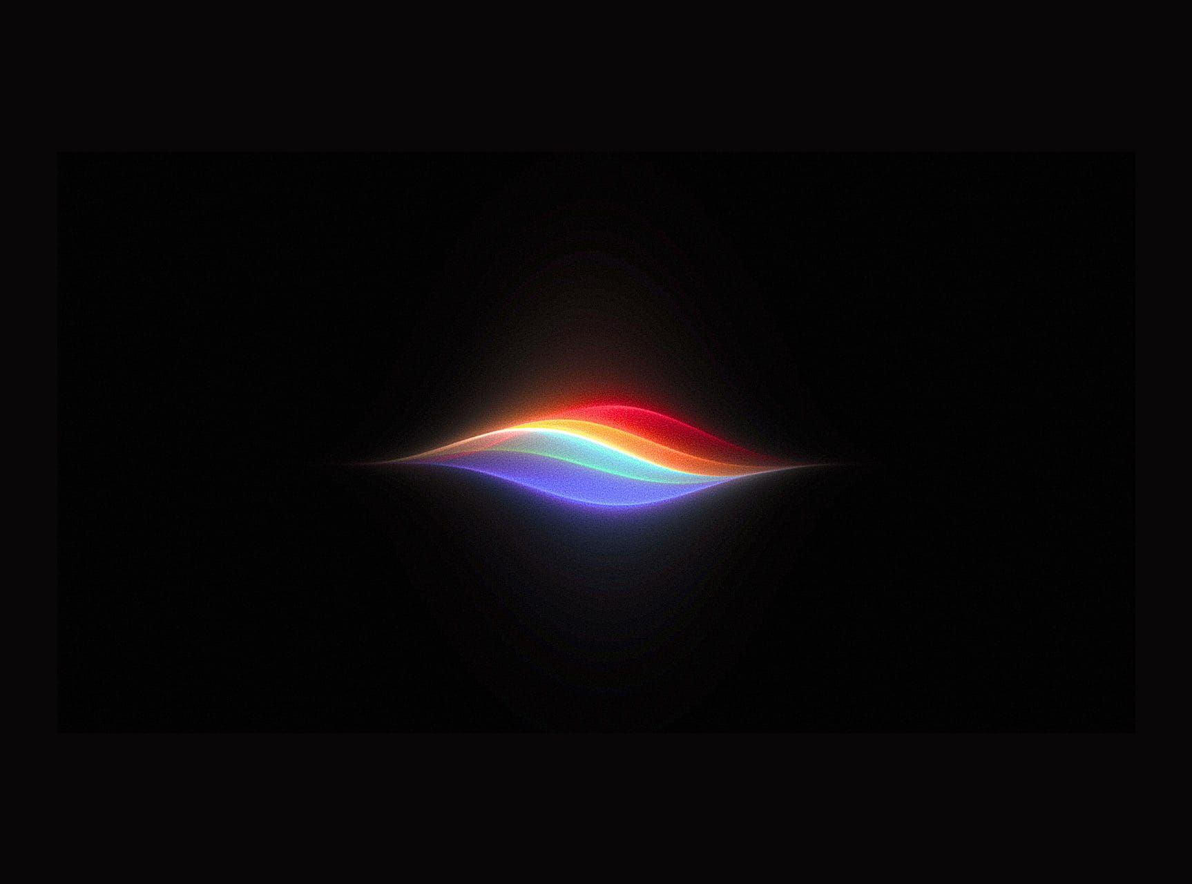 Die neue leuchtende Animation der Siri AI auf schwarzem Hintergrund symbolisiert die Integration von Apple Intelligence.