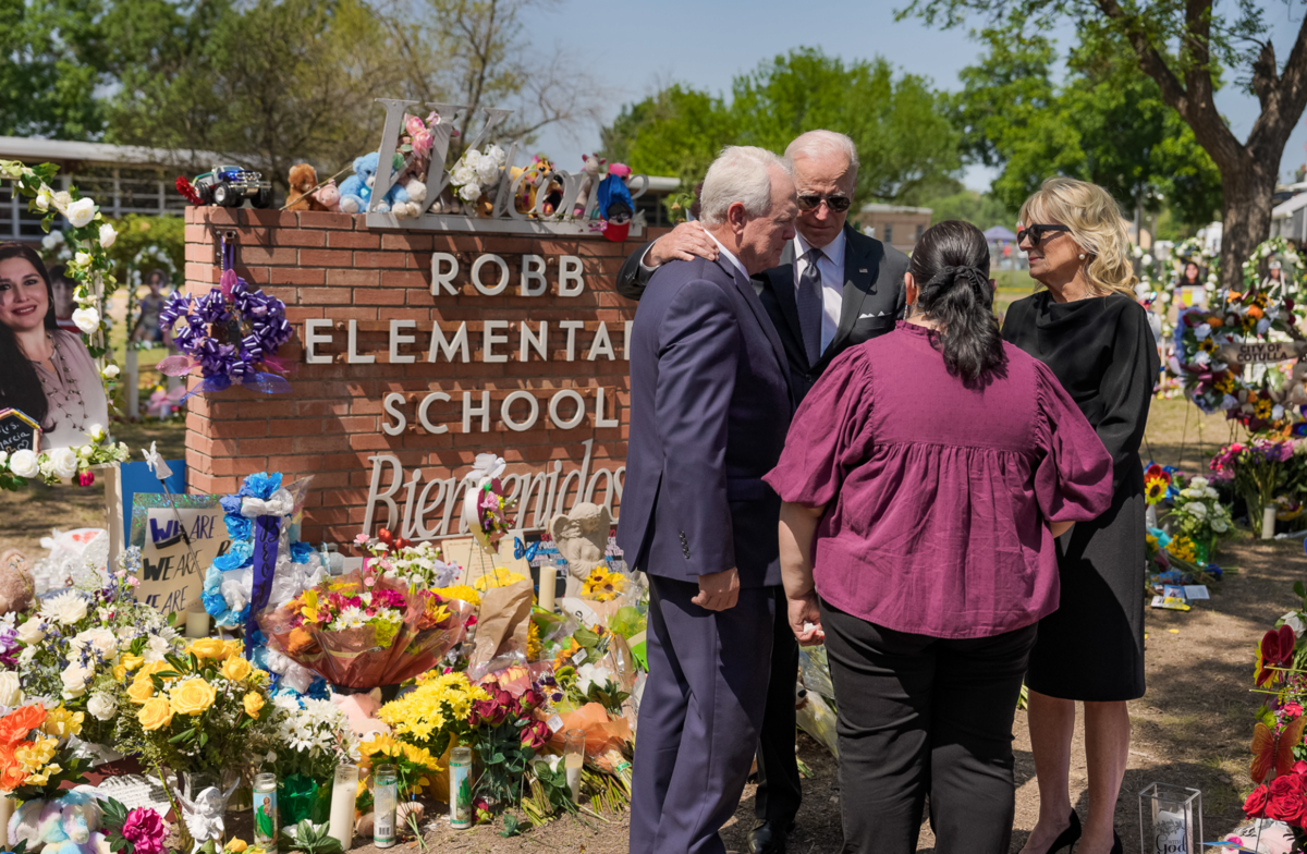 Joe and Jill Biden standing in front of Robb Elementary School in Uvalde, Texas.