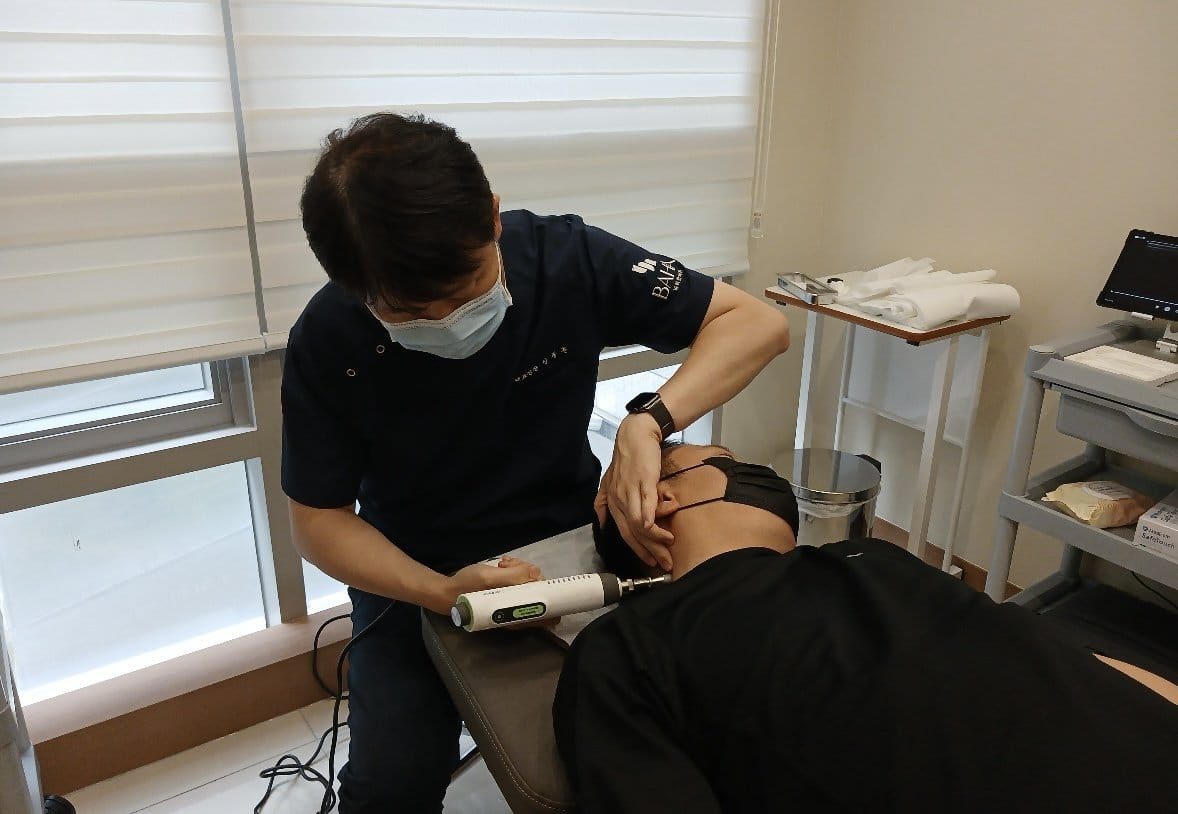 Manual therapy device treatment for neck and shoulder tension