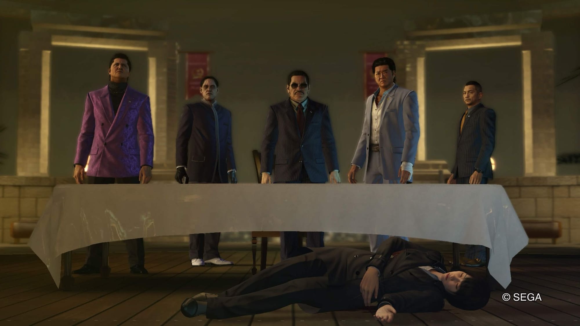 "A Yakuza 0 screenshot of Sohei Dojima standing beside his three lieutenants and a hired assassin while Makoto Makimura lies on the ground before them, recently shot."
