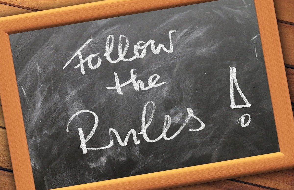 follow the rules sign