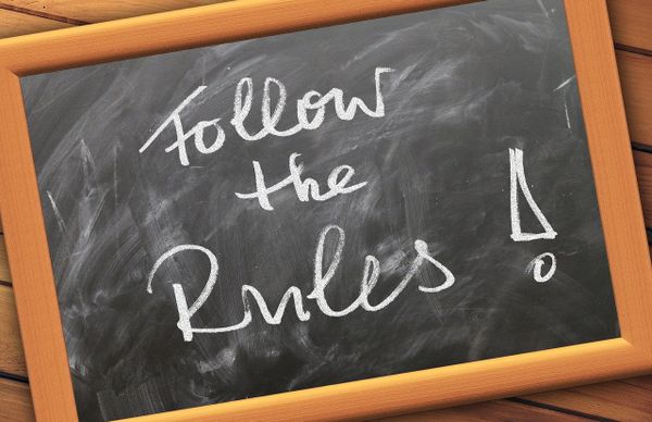 follow the rules sign
